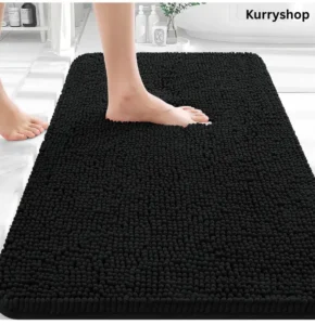 Soft black chenille bathroom rug absorbing water and drying quickly after showers