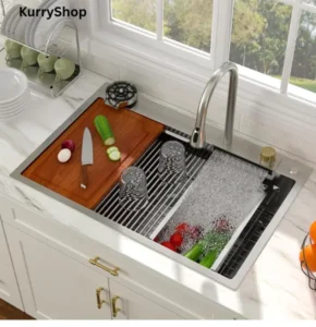 Smart waterfall kitchen sink workstation with built-in faucet and prep accessories used during everyday cooking
